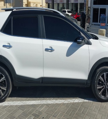 Kia KX1 2025 — side angle view