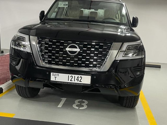 Nissan Patrol 2023 — side angle view